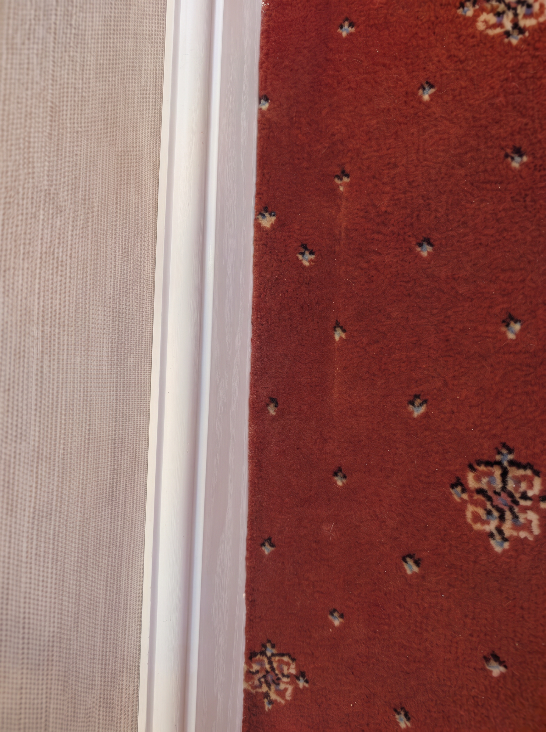 Carpet repair by a doorway in Staffordshire, after professional cleaning