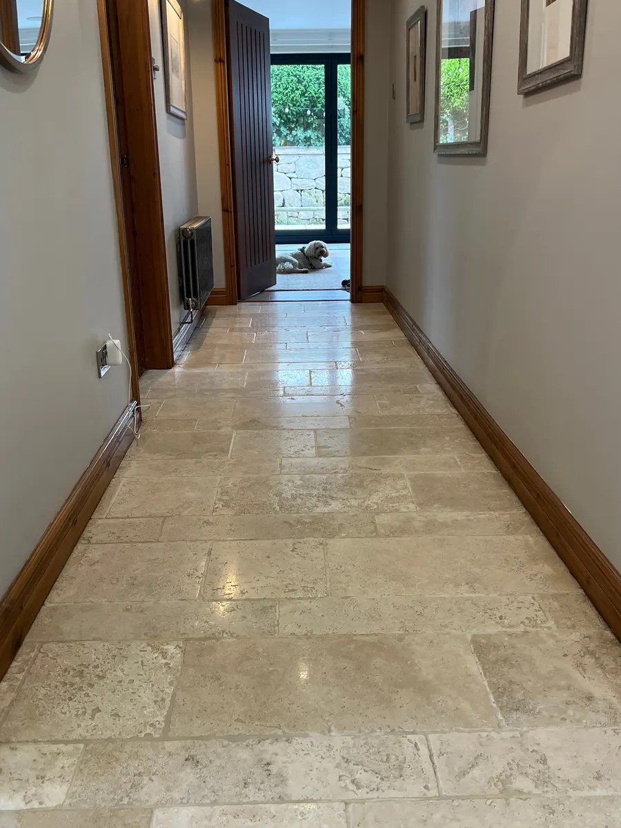 Restored tiled hallway floor in Staffordshire after professional cleaning, shown before and after, before professional cleaning