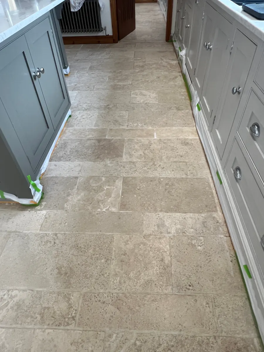 Restored tiled hallway floor in Staffordshire after professional cleaning, shown before and after, after professional cleaning